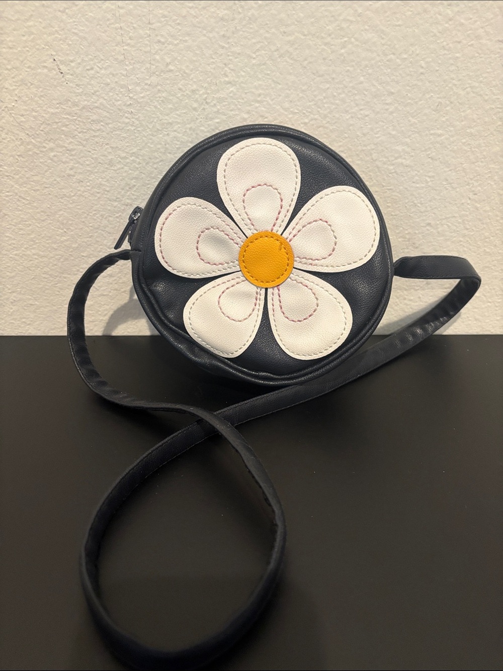 Women's Navy Circle Crossbody Bag with White Daisy